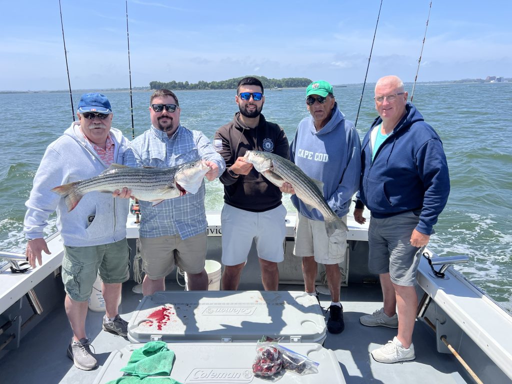 Boston Harbor striped bass fishing.